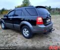 Черный Киа Соренто, объемом двигателя 2.5 л и пробегом 200 тыс. км за 9700 $, фото 1 на Automoto.ua