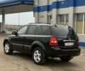 Черный Киа Соренто, объемом двигателя 2.5 л и пробегом 240 тыс. км за 5350 $, фото 1 на Automoto.ua
