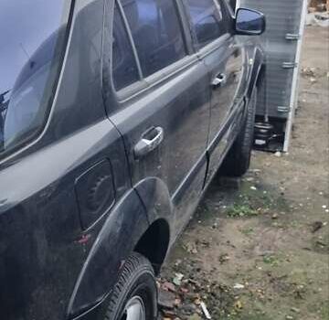 Черный Киа Соренто, объемом двигателя 2.5 л и пробегом 300 тыс. км за 4600 $, фото 11 на Automoto.ua