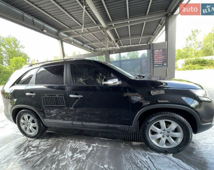 Чорний Кіа Соренто, об'ємом двигуна 2.4 л та пробігом 100 тис. км за 11500 $, фото 1 на Automoto.ua