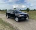 Чорний Кіа Соренто, об'ємом двигуна 2.4 л та пробігом 195 тис. км за 11900 $, фото 1 на Automoto.ua