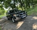 Чорний Кіа Соренто, об'ємом двигуна 2.4 л та пробігом 195 тис. км за 12500 $, фото 2 на Automoto.ua