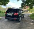 Чорний Кіа Соренто, об'ємом двигуна 2.4 л та пробігом 195 тис. км за 12500 $, фото 7 на Automoto.ua