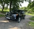 Чорний Кіа Соренто, об'ємом двигуна 2.4 л та пробігом 195 тис. км за 12500 $, фото 3 на Automoto.ua