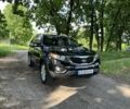 Чорний Кіа Соренто, об'ємом двигуна 2.4 л та пробігом 195 тис. км за 12500 $, фото 1 на Automoto.ua