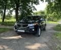 Чорний Кіа Соренто, об'ємом двигуна 2.4 л та пробігом 195 тис. км за 12500 $, фото 1 на Automoto.ua