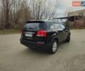 Черный Киа Соренто, объемом двигателя 2.4 л и пробегом 225 тыс. км за 13000 $, фото 4 на Automoto.ua