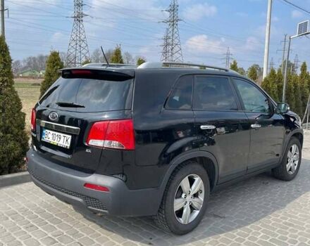 Черный Киа Соренто, объемом двигателя 2.4 л и пробегом 210 тыс. км за 12500 $, фото 2 на Automoto.ua
