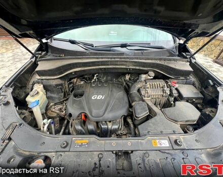 Черный Киа Соренто, объемом двигателя 2.4 л и пробегом 265 тыс. км за 12000 $, фото 4 на Automoto.ua