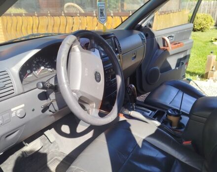 Чорний Кіа Соренто, об'ємом двигуна 2.4 л та пробігом 300 тис. км за 7300 $, фото 5 на Automoto.ua