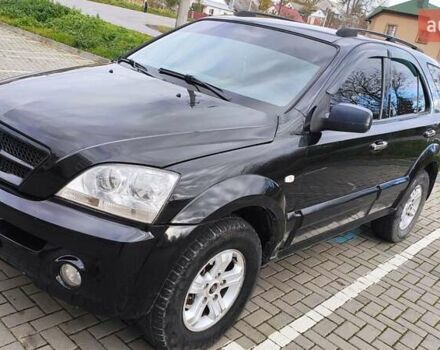 Черный Киа Соренто, объемом двигателя 2.5 л и пробегом 240 тыс. км за 7500 $, фото 1 на Automoto.ua