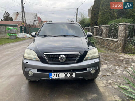 Черный Киа Соренто, объемом двигателя 2.5 л и пробегом 300 тыс. км за 4000 $, фото 1 на Automoto.ua