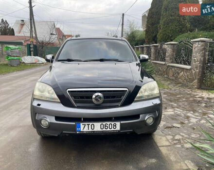 Черный Киа Соренто, объемом двигателя 2.5 л и пробегом 300 тыс. км за 4000 $, фото 1 на Automoto.ua