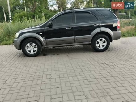 Черный Киа Соренто, объемом двигателя 2.5 л и пробегом 261 тыс. км за 4900 $, фото 1 на Automoto.ua