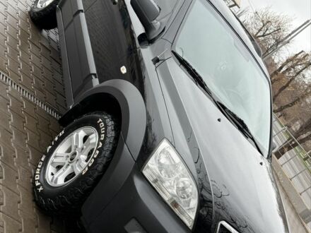 Черный Киа Соренто, объемом двигателя 2.5 л и пробегом 210 тыс. км за 4500 $, фото 1 на Automoto.ua