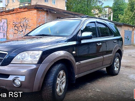 Черный Киа Соренто, объемом двигателя 2.5 л и пробегом 350 тыс. км за 4000 $, фото 1 на Automoto.ua