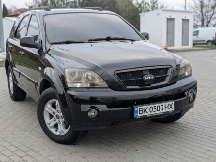Черный Киа Соренто, объемом двигателя 2.5 л и пробегом 300 тыс. км за 8000 $, фото 1 на Automoto.ua