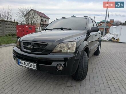 Черный Киа Соренто, объемом двигателя 2.5 л и пробегом 300 тыс. км за 8000 $, фото 1 на Automoto.ua