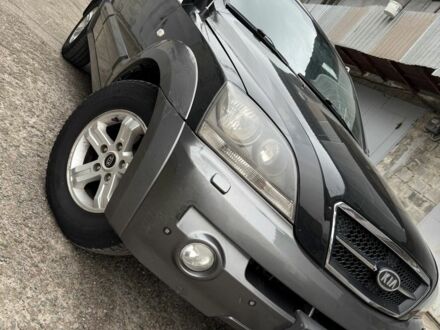 Черный Киа Соренто, объемом двигателя 2.5 л и пробегом 370 тыс. км за 4999 $, фото 1 на Automoto.ua