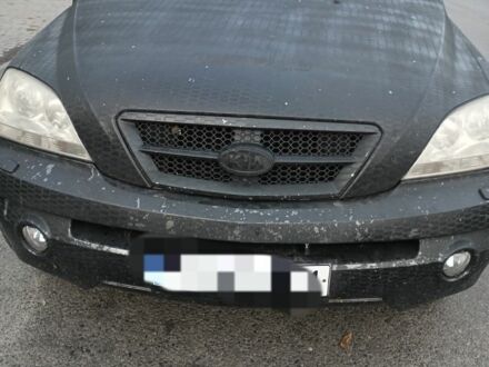 Черный Киа Соренто, объемом двигателя 2.5 л и пробегом 380 тыс. км за 4200 $, фото 1 на Automoto.ua