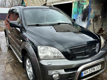 Черный Киа Соренто, объемом двигателя 2.5 л и пробегом 350 тыс. км за 7300 $, фото 1 на Automoto.ua