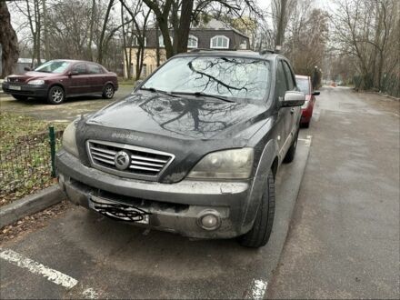 Черный Киа Соренто, объемом двигателя 2.5 л и пробегом 327 тыс. км за 6200 $, фото 1 на Automoto.ua