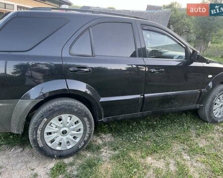 Черный Киа Соренто, объемом двигателя 2.5 л и пробегом 180 тыс. км за 4900 $, фото 1 на Automoto.ua