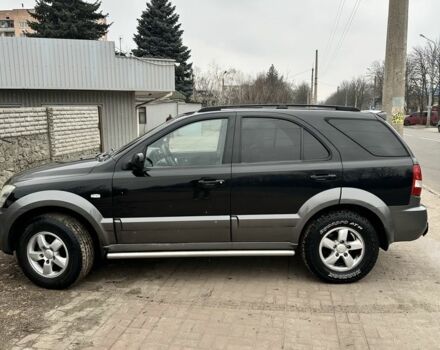 Черный Киа Соренто, объемом двигателя 2.5 л и пробегом 335 тыс. км за 4000 $, фото 1 на Automoto.ua