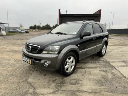 Черный Киа Соренто, объемом двигателя 2.5 л и пробегом 280 тыс. км за 4900 $, фото 1 на Automoto.ua