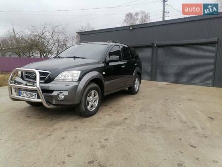 Чорний Кіа Соренто, об'ємом двигуна 2.5 л та пробігом 294 тис. км за 7400 $, фото 1 на Automoto.ua