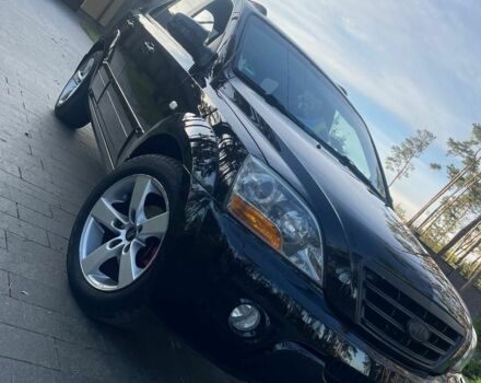 Черный Киа Соренто, объемом двигателя 2.5 л и пробегом 255 тыс. км за 8600 $, фото 1 на Automoto.ua