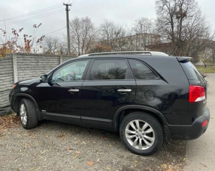 Черный Киа Соренто, объемом двигателя 2.4 л и пробегом 256 тыс. км за 12000 $, фото 1 на Automoto.ua