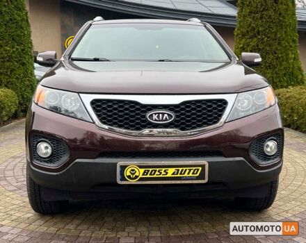 Коричневый Киа Соренто, объемом двигателя 2.4 л и пробегом 145 тыс. км за 10500 $, фото 1 на Automoto.ua