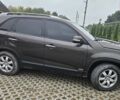 Коричневый Киа Соренто, объемом двигателя 2.4 л и пробегом 128 тыс. км за 11000 $, фото 4 на Automoto.ua