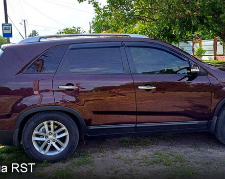 Коричневый Киа Соренто, объемом двигателя 2.4 л и пробегом 170 тыс. км за 11300 $, фото 2 на Automoto.ua