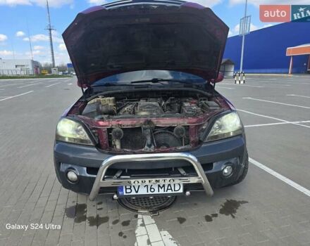 Красный Киа Соренто, объемом двигателя 2.5 л и пробегом 240 тыс. км за 5000 $, фото 12 на Automoto.ua