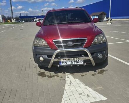 Красный Киа Соренто, объемом двигателя 2.5 л и пробегом 240 тыс. км за 5000 $, фото 4 на Automoto.ua