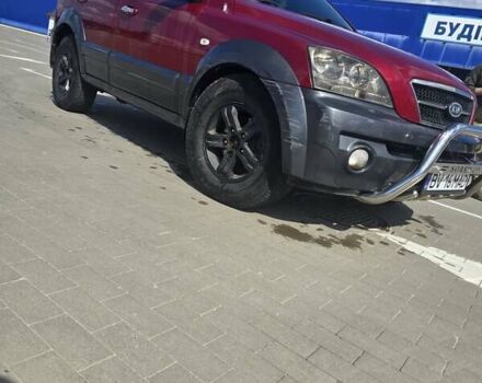 Красный Киа Соренто, объемом двигателя 2.5 л и пробегом 240 тыс. км за 5000 $, фото 5 на Automoto.ua