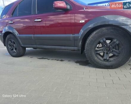 Красный Киа Соренто, объемом двигателя 2.5 л и пробегом 240 тыс. км за 5000 $, фото 16 на Automoto.ua