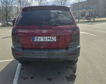 Красный Киа Соренто, объемом двигателя 2.5 л и пробегом 240 тыс. км за 5000 $, фото 2 на Automoto.ua