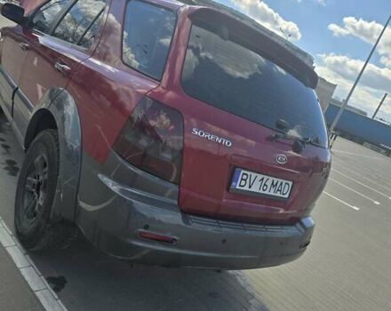 Красный Киа Соренто, объемом двигателя 2.5 л и пробегом 240 тыс. км за 5000 $, фото 1 на Automoto.ua