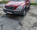 Червоний Кіа Соренто, об'ємом двигуна 2.5 л та пробігом 345 тис. км за 4500 $, фото 1 на Automoto.ua