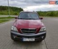 Красный Киа Соренто, объемом двигателя 2.5 л и пробегом 122 тыс. км за 6000 $, фото 1 на Automoto.ua