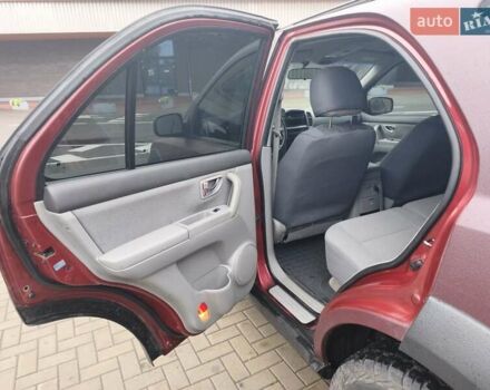 Красный Киа Соренто, объемом двигателя 2.5 л и пробегом 308 тыс. км за 7500 $, фото 4 на Automoto.ua