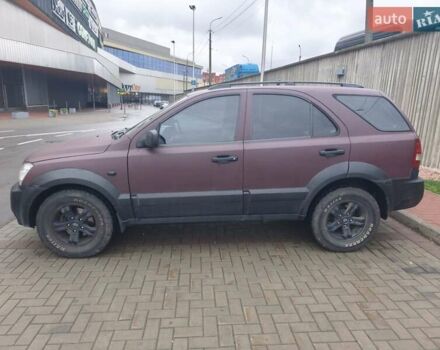 Красный Киа Соренто, объемом двигателя 2.5 л и пробегом 308 тыс. км за 7500 $, фото 3 на Automoto.ua
