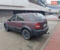 Красный Киа Соренто, объемом двигателя 2.5 л и пробегом 308 тыс. км за 7500 $, фото 7 на Automoto.ua