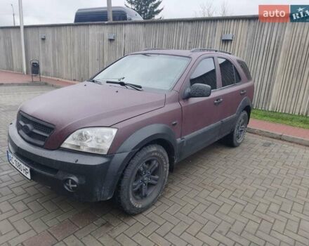 Красный Киа Соренто, объемом двигателя 2.5 л и пробегом 308 тыс. км за 7500 $, фото 1 на Automoto.ua