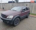 Красный Киа Соренто, объемом двигателя 2.5 л и пробегом 308 тыс. км за 7500 $, фото 1 на Automoto.ua