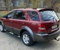 Красный Киа Соренто, объемом двигателя 2.5 л и пробегом 200 тыс. км за 3150 $, фото 3 на Automoto.ua