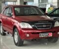Красный Киа Соренто, объемом двигателя 2.4 л и пробегом 203 тыс. км за 6440 $, фото 1 на Automoto.ua